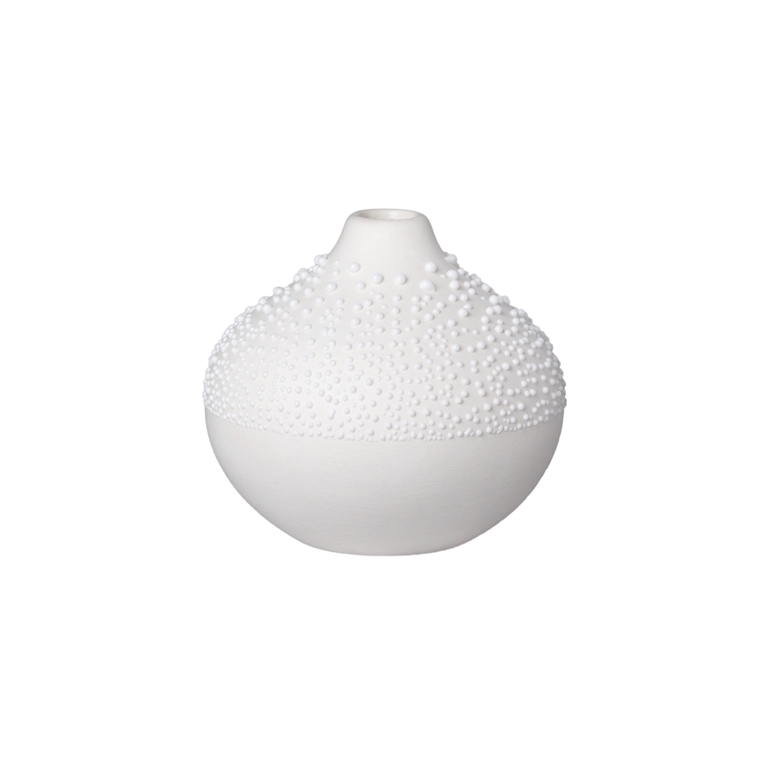 Vase en porcelaine blanche avec des gouttelettes