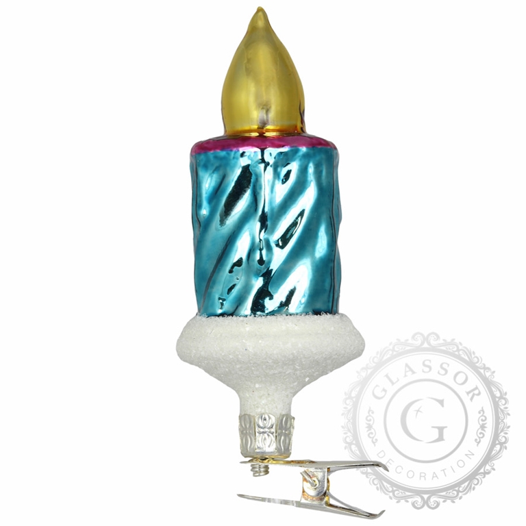 Bougie turquoise avec une flamme