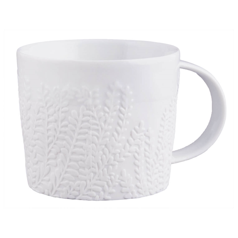 Tasse avec des fougeres