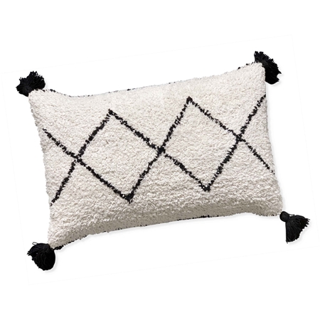 Oreiller en coton avec un motif et des franges