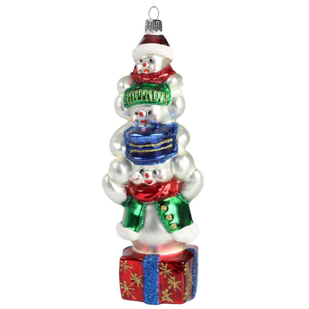 Figurine de Noël, Trois bonhommes de neige sur un cadeau