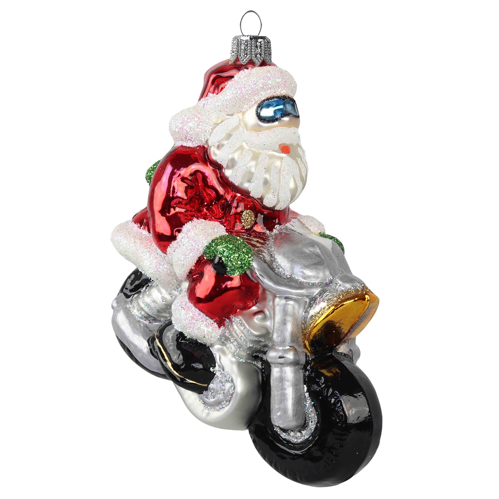 Figurine de Pere Noël en verre sur une moto
