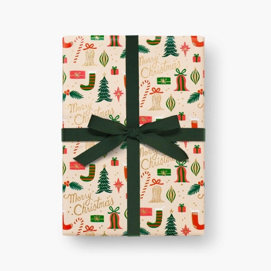 Papier cadeau aux motifs de Noël dorés