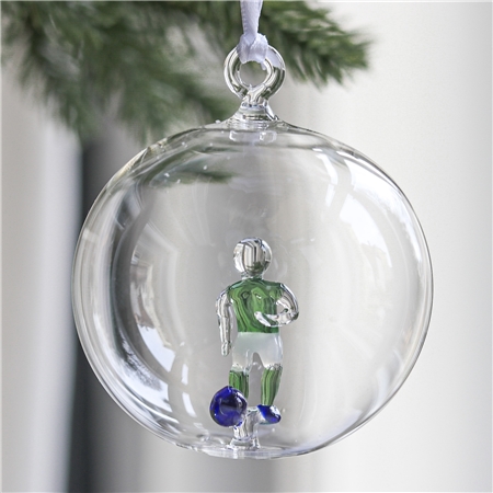 Boule en verre transparente, joueur de football