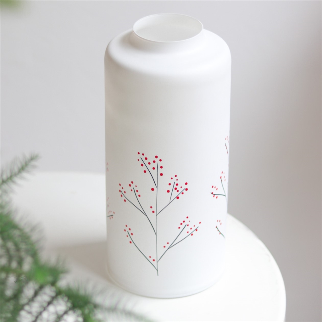 Vase en verre blanc à décor de houx