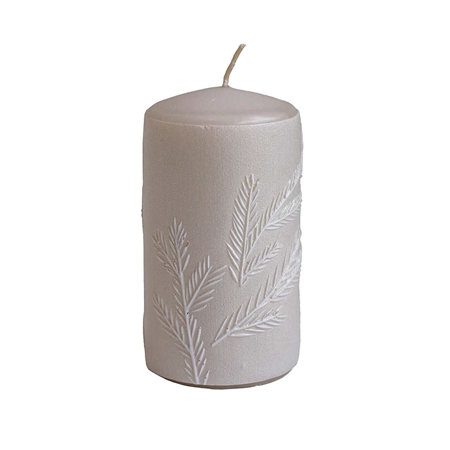 Bougie beige à décor de genévrier