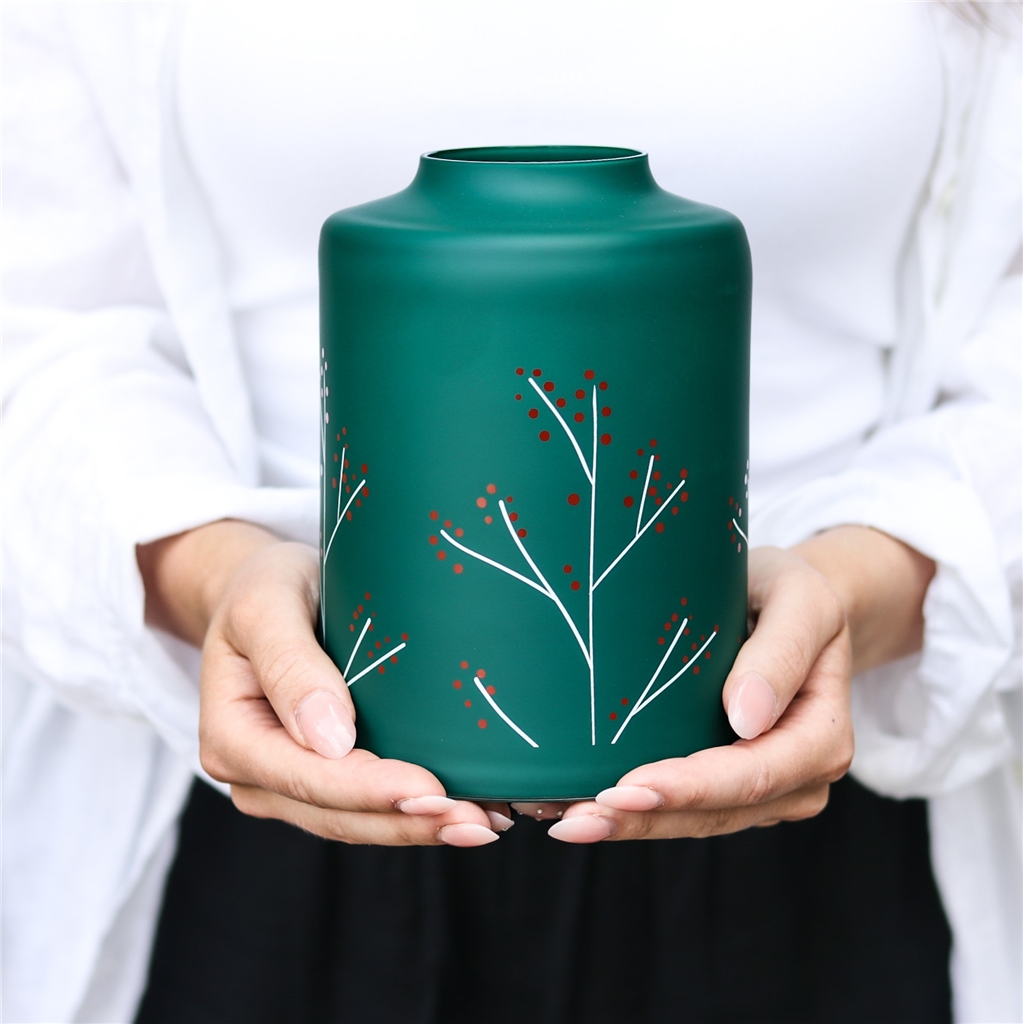 Vase en verre vert à décor de houx