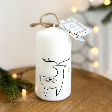 Bougie blanche à décor de chevrons
