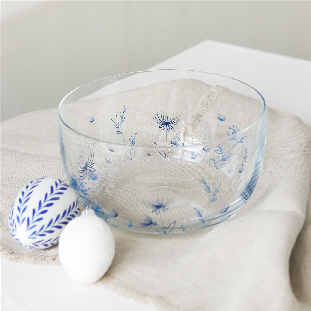 Bol en verre avec plantes bleues