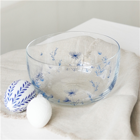 Bol en verre avec plantes bleues