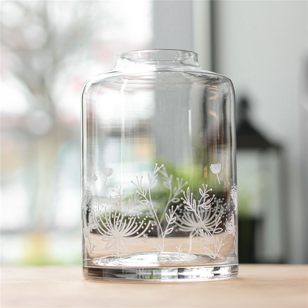 Vase transparent avec décoration florale