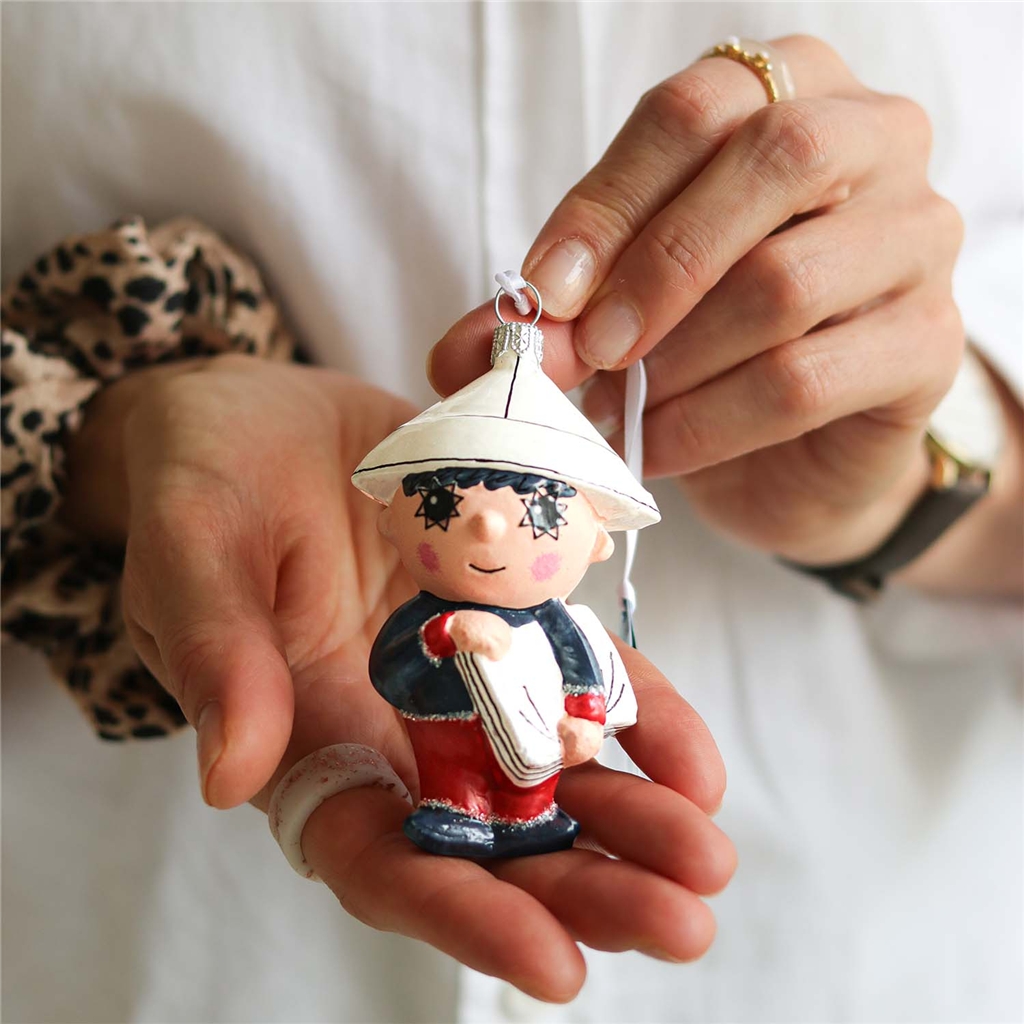 Figurine étoile du soir avec journal